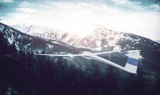 istock The glider is flying in the mountains 1215999344