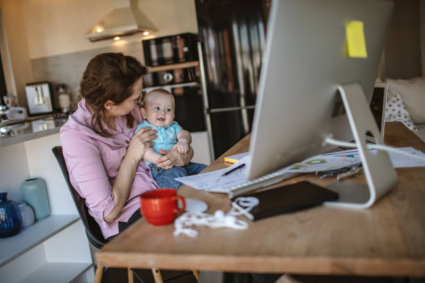 istock Mother with son working from home 1216000295