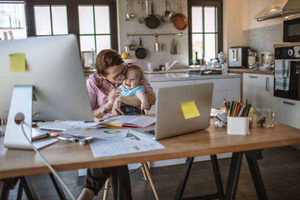 istock Mother with son working from home 1216001051