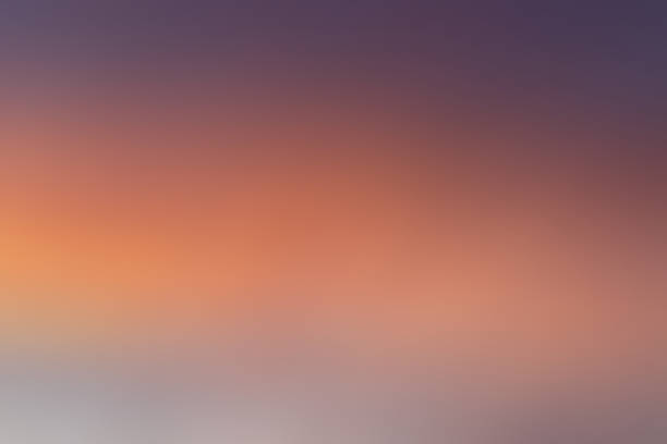 istock Beautiful sunset orange, blue, purple gradient background 1216001287