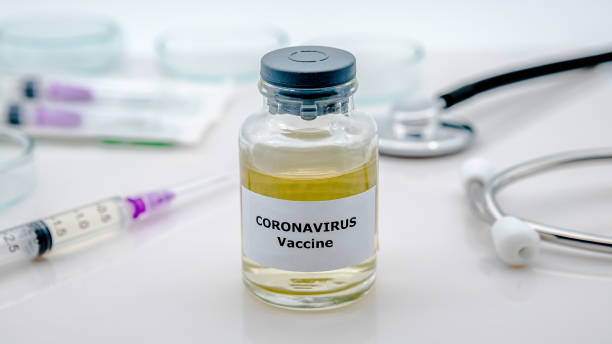 istock Sample for Covid 19 vaccination and syringe injection. Preventive medications. 1216002126