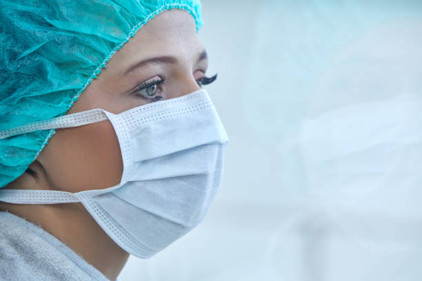 istock Woman with mouthguard, headshot, sideview 1216004445