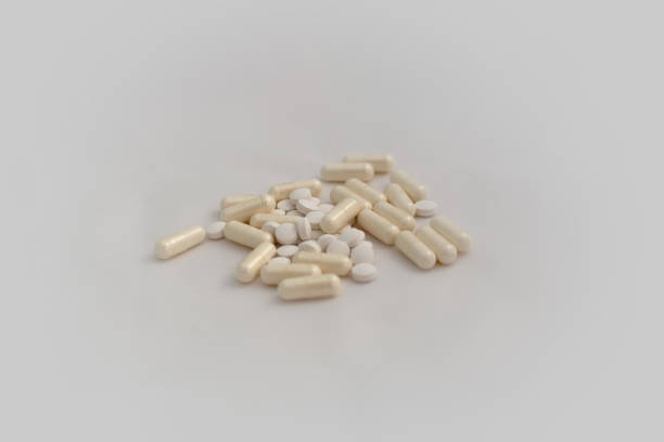 istock Bunch of pills - tablets and capsules - on white background 1216008714