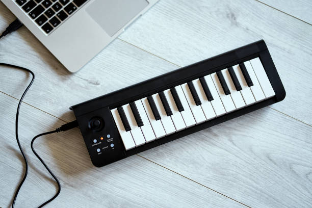 istock keyboard musical instrument on a white floor 1216015233