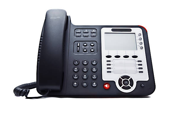 istock Black-corded dial phone with white background 121601753