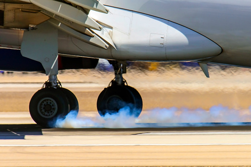 Commercial passenger jet touching down