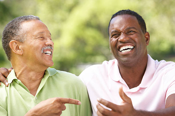 istock Father With Adult Son In Park 121601986