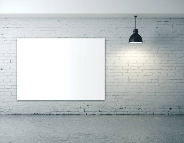 istock Art room with blank poster on brick wall 1216021463