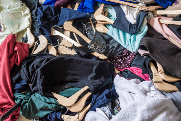 istock pile of used clothes. Second hand for recycling 1216022895