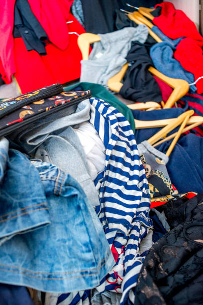 istock pile of used clothes. Second hand for recycling 1216022930