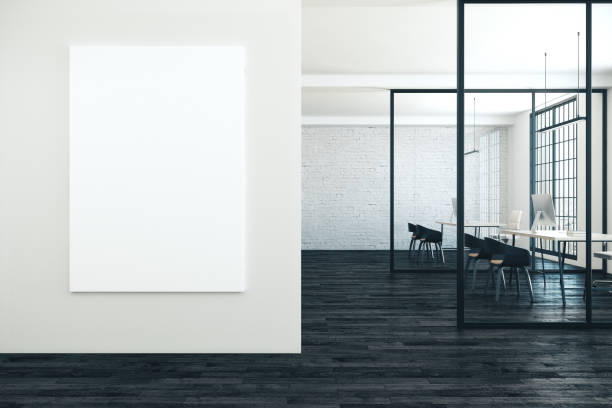 istock Modern coworking office with empty poster 1216023240