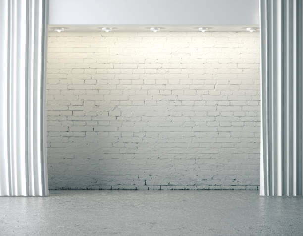 istock brick grunge wall with ceiling lamp and curtains. 1216023323