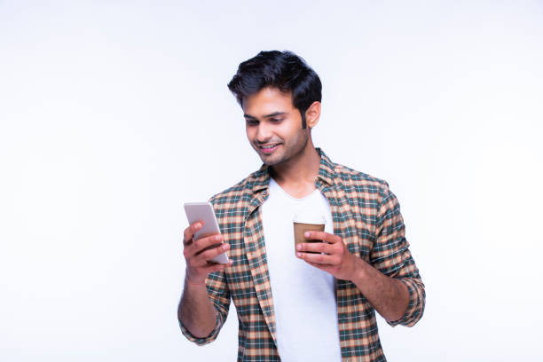 istock Indian man using mobile phone. stock photo 1216024381