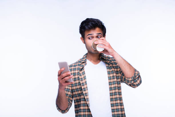 istock Indian man using mobile phone. stock photo 1216024419