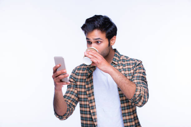 istock Indian man using mobile phone. stock photo 1216024635