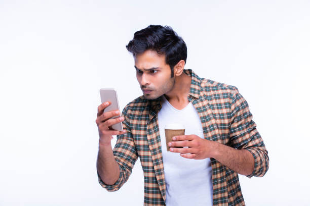 istock Indian man using mobile phone. stock photo 1216024690