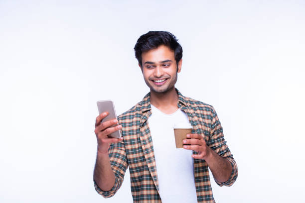 istock Indian man using mobile phone. stock photo 1216024760