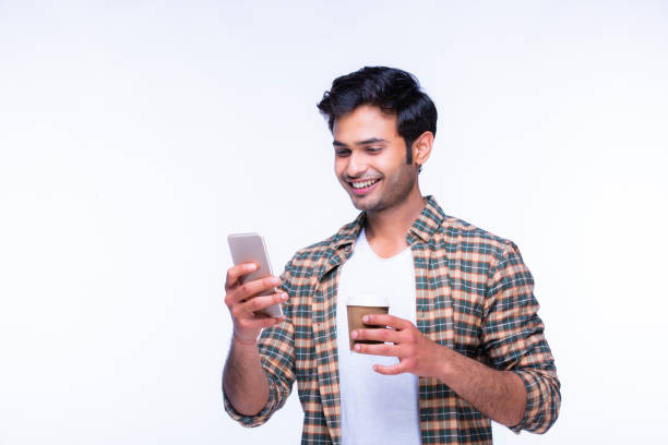 istock Indian man using mobile phone. stock photo 1216024823