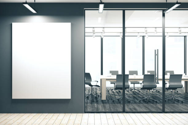 istock Meeting room corridor with blank poster 1216026982