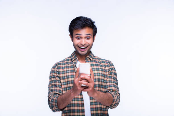 istock Indian man using mobile phone. stock photo 1216027406