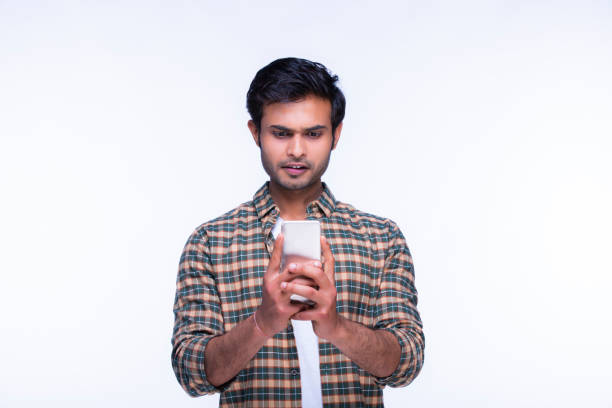istock Indian man using mobile phone. stock photo 1216027427