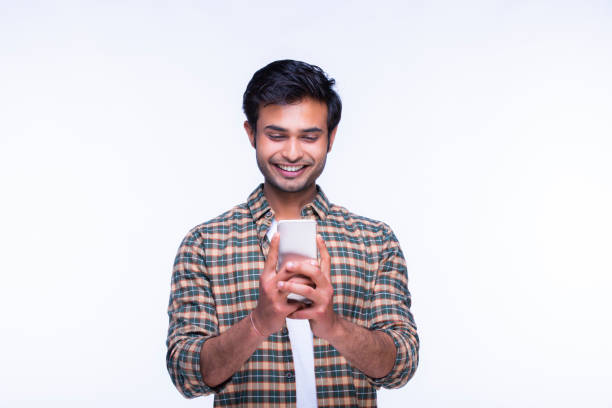 istock Indian man using mobile phone. stock photo 1216027465