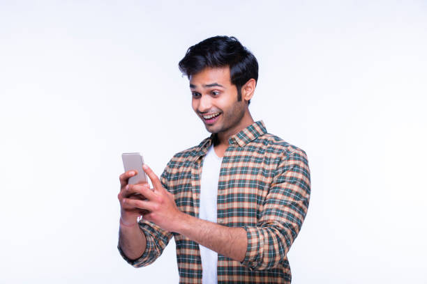 istock Indian man using mobile phone. stock photo 1216027614