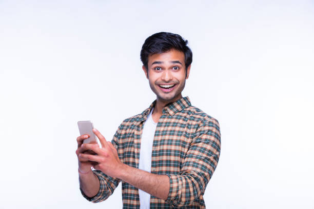 istock Indian man using mobile phone. stock photo 1216027746