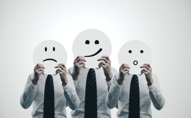istock Three businessmans holding poster with a smile. 1216028888