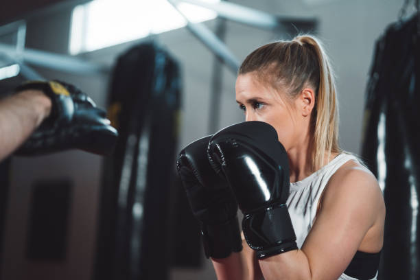 istock Strong female boxer ready for action 1216029053