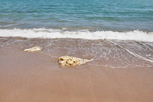 Soft wave of ocean on the sandy beach