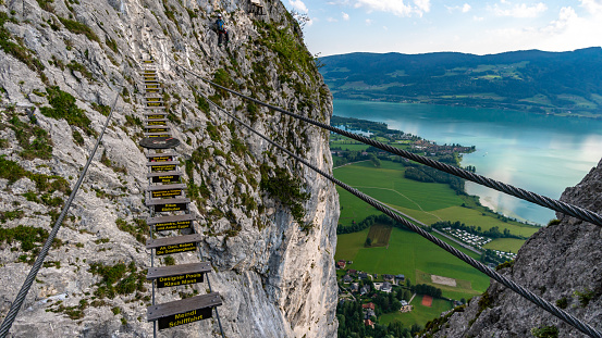 Climbing on the Drachenwand via ferrata at the beautiful Mondsee