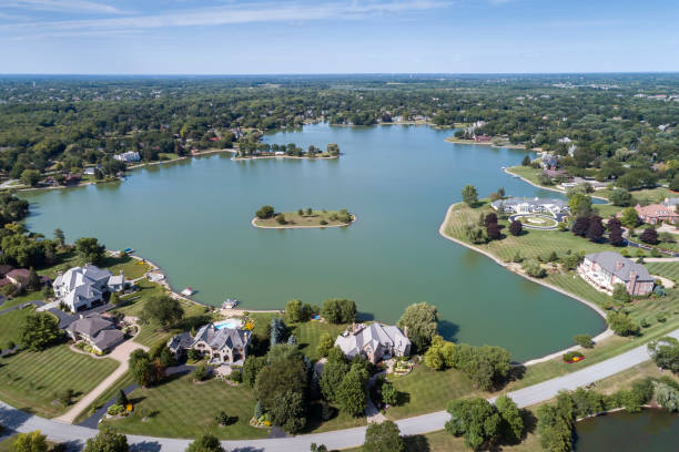 istock Aerial Neighborhood View with Lake 1216032010