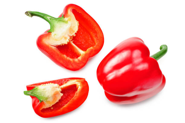 istock red sweet bell pepper with slices isolated on white background. top view 1216032231