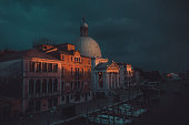 Moody cityscape of Venice during sunset in Italy