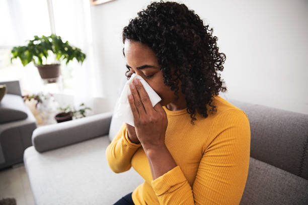 istock Woman With a Runny Nose 1216033705