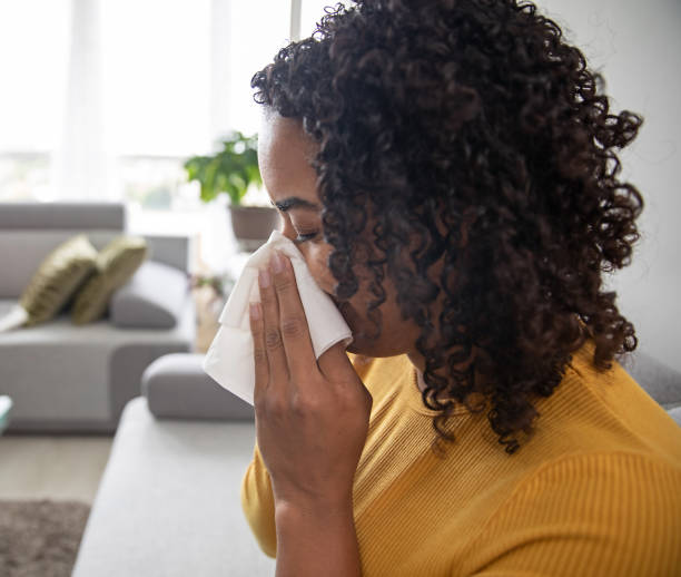 istock Woman With a Runny Nose 1216033715