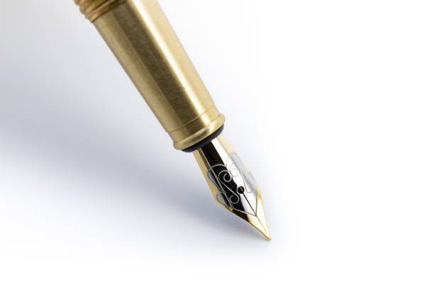 istock Fountain pen detail with narrow focus on white background 1216034808