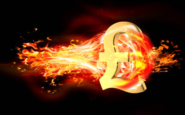 istock Pound Symbol is Burning in Flames Against Black Background 1216035933