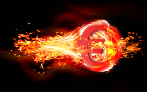 istock Euro Symbol is Burning in Flames Against Black Background 1216035953