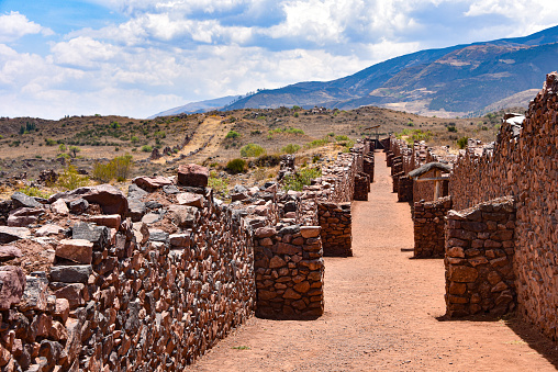The stone walls of Pikillaqta, a large Wari culture archaeological site 20 kilometres south east of Cusco in the Quispicanchi Province. Cusco, Peru.