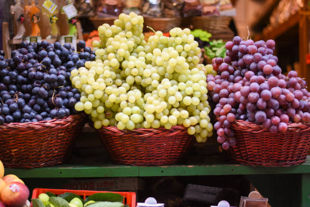 istock Tasty white, black grapes in Italy store 1216037159