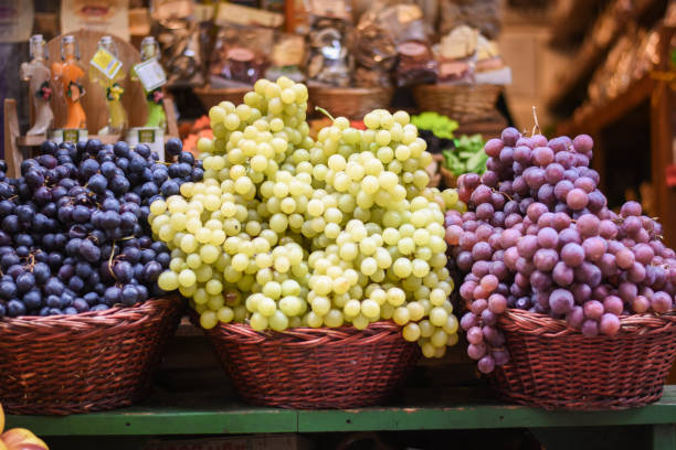 istock Tasty white, black grapes in Italy store 1216037176
