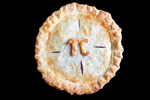 Pie with Pi symbol baked on top isolated o a black background