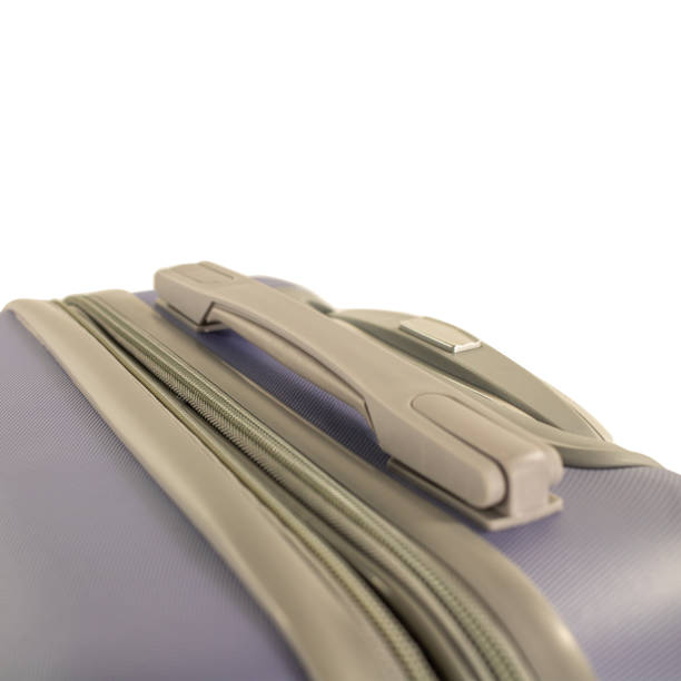 istock New pink suitcase isolated above white background. 1216039046