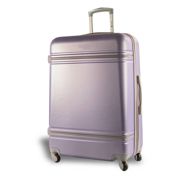 istock New pink suitcase isolated above white background. 1216039049