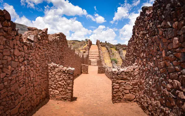 The stone walls of Pikillaqta, a large Wari culture archaeological site 20 kilometres south east of Cusco in the Quispicanchi Province. Cusco, Peru.