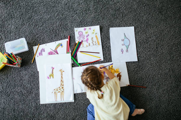 istock Young dad have fun drawing with little daughter 1216042054