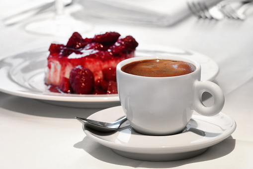 espresso with dessert on the table