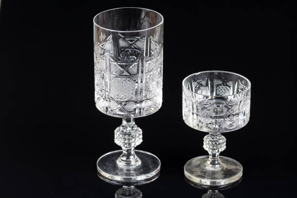 istock Crystal glass on a black background with reflections 1216044526